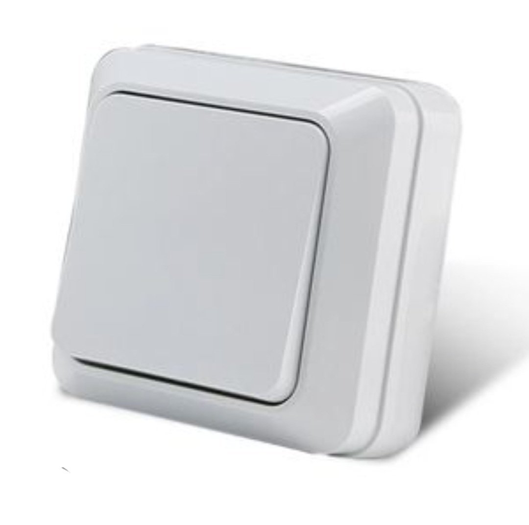 interrupteur mural à bouton-poussoir blanc.